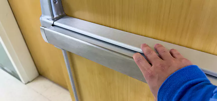 Installing a Push Bar on a Door Coram